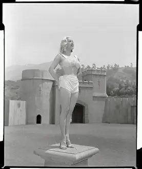 Actress Mamie Van Doren Posing in Front of Castle