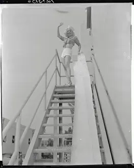 Actress Mamie Van Doren Waving from Steps