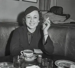 Actress Margaret Lindsay Having Cigarette at Brown Derby Cafe