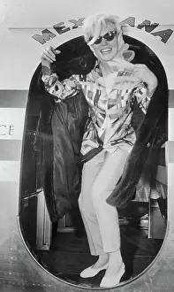 Passenger Airplane Prints: Actress Marilyn Monroe Coming Back from Vacation