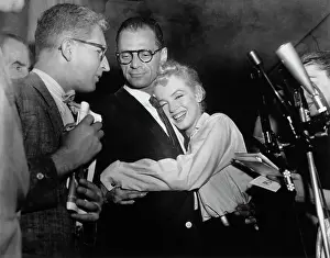 Actress Marilyn Monroe Hugging Arthur Miller