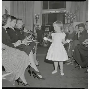Actress Micheline Presle's Young Daughter Modeling for Audience