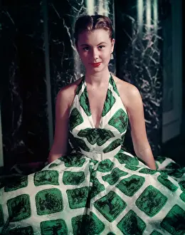 Actress Mitzi Gaynor Wearing Halter Top Dress with Animal Graphics