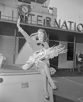 Actress Pier Angeli Waving Near Airline Building