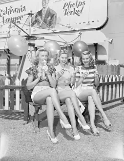 Legs Crossed Prints: Three Actress Resting at Amusement Park