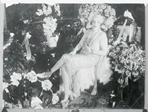 Actress Sari Fedak Near Flower Arrangements