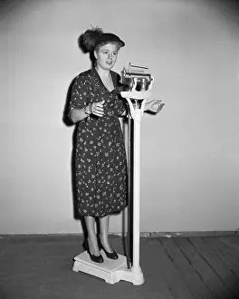 Actress Shelley Winters Being Weighed on a Scale