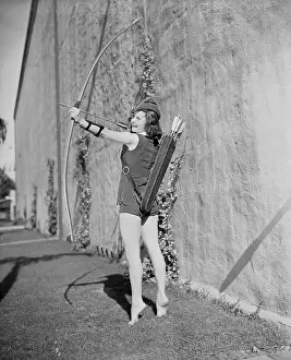 Actress Susan Hayward Holding Bow and Arrow