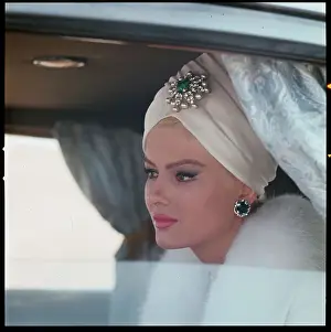 Actress Virna Lisi in Limousine Wearing Turban