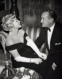 Actress Zsa Zsa Gabor and George Sanders in Scene
