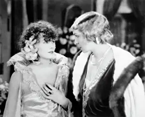 Prints of (Original Caption). The Hollywood Of Yore: Lost Films: Scorned by her pleasure-loving mother, Marianne is brought up on a farm in Brittany Timeless Elegance: The Iconic Greta Garbo Collection: Actresses Greta Garbo and Dorothy Cumming in The Divine Woman