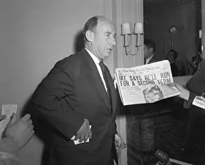 Adlai Stevenson Receiving Newspaper