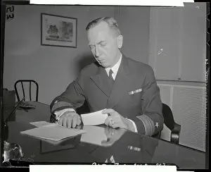 Admiral Royal Ingersoll Sitting at Desk