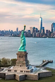 Liberty Enlightening the World Gallery: Aerial of the Statue of Liberty at sunset, New York, USA