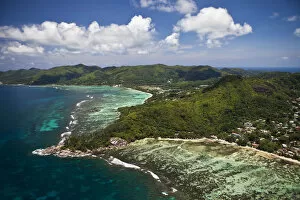 Aerial view, Anse Aux Courbes and Anse Royal, Southern Mahe, Mahe, Seychelles, Africa, Indian Ocean