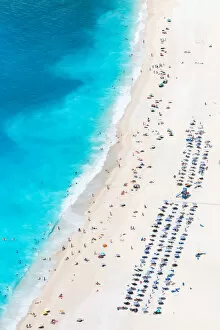Crowded Gallery: Aerial view of beach crowded with people in summer