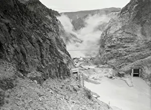 Prints of (Original Caption). Near Las Vegas: 4-Ton Dynamite Blast Set Off At Hoover Dam Site A Timeless Collection of Hoover Dam Photography: Aerial View of Hoover Dam Site