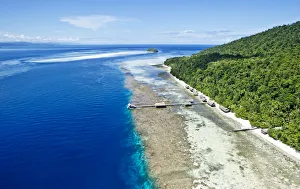 Images Dated 16th April 2016: Aerial view of island jetty with sea and hill
