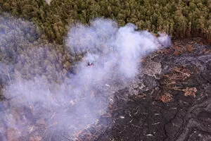 Images Dated 3rd November 2015: Aerial view of lava from Mauna Loa and burning forest, Big Island, Hawaii, USA