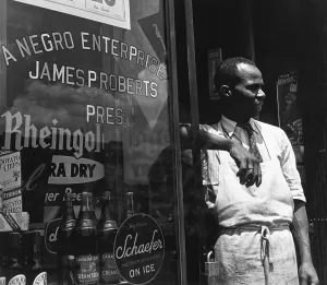 Storefront Prints: African American Store Owner in Front of Store