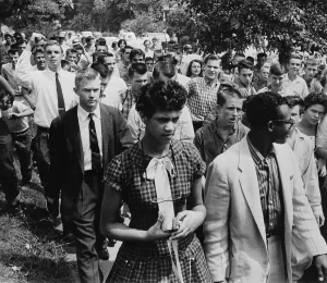 Escorting Prints: African American Student Followed by Crowd After School Enrolment