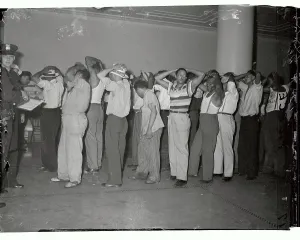 Suspect Prints: African Americans Being Searched at Courthouse