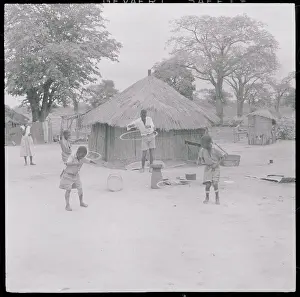 Livingstone Prints: African Children Enjoying Hula Hoops