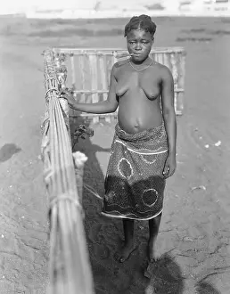 African Native Woman with Pipe in Her Mouth