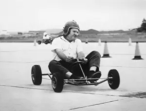 General Prints: Air Force Chief of Staff Curtis Lemay Driving Go-Cart