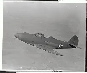 Us Air Force Plane P-39 Flying Over Land