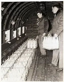 Supply Prints: Air Force Soldiers Loading Fresh Milk