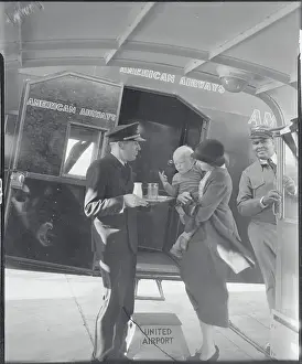 Infancy Prints: Air Steward Offering Milk to Baby