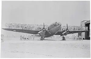 Airmen Standing on Plane
