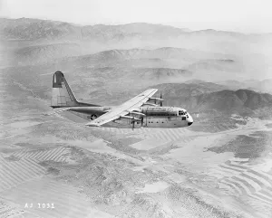 Burbank Prints: Airplane Flying Over Landscape
