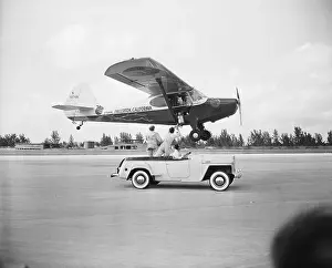 Miami Prints: Airplane Being Refueled In-Flight