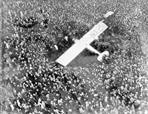 Louis Airplane Prints: Airplane Surrounded by Massive Crowds
