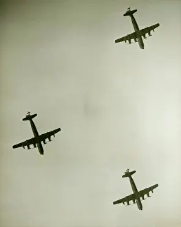 Propeller Prints: Three airplanes in flight, (B&W), view from below