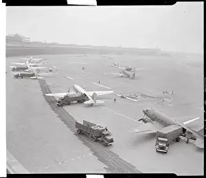 Airplanes and Trucks on Runway