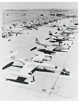 Airplanes and Workers on Runway