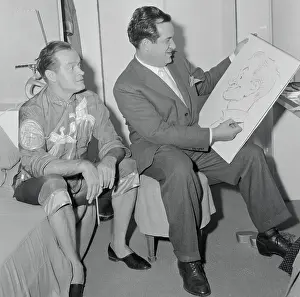 Cartoonist Prints: Al Capp Drawing a Caricature of Bob Hope