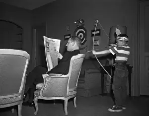 Al Gore Pointing a Bow and Arrow at Senator Albert Gore's Head