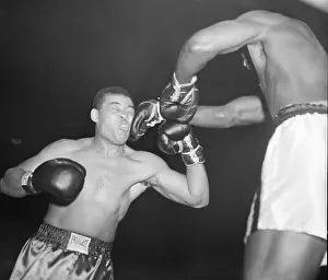 Al Hoosman Delivers Right to Joe Louis
