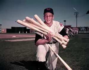 Al Rosen Holding Several Baseball Bats