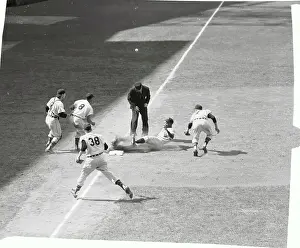 Al Smith Sliding Safely Into Third Base