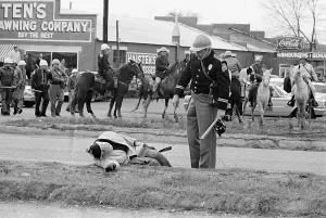 Selma Prints: Alabama State Trooper With Unconscious Woman
