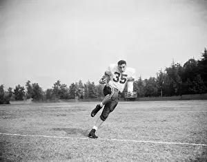 Alan Ameche Running With a Football