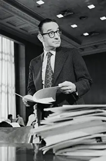 Alan Greenspan Holding Papers