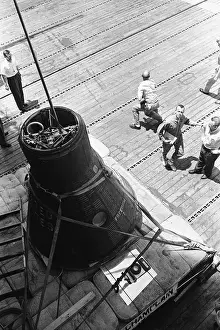 Shepard Prints: Alan Shepard Looks At His Space Capsule