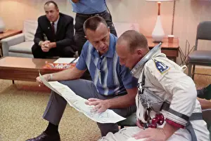 Shepard Prints: Alan Shepard and Pete Conrad Reading Flight Plan