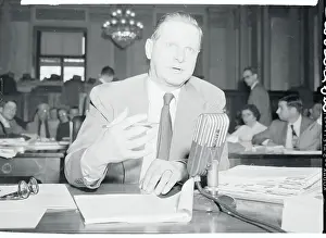 Lehman Prints: Albert Cole Sitting Behind a Microphone